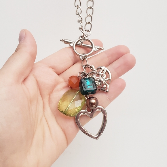 Two Silver Hearts With Mixed Charms Toggle/Bar Statement Necklace - Picture 3 of 6